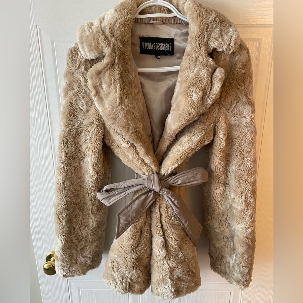 Beige fur coat